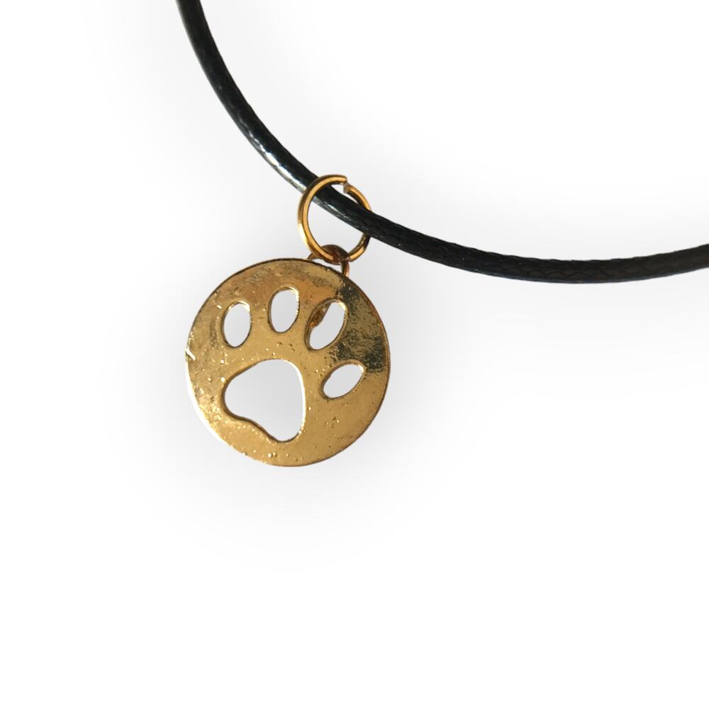 Tiny gold tone paw-print pendant necklace